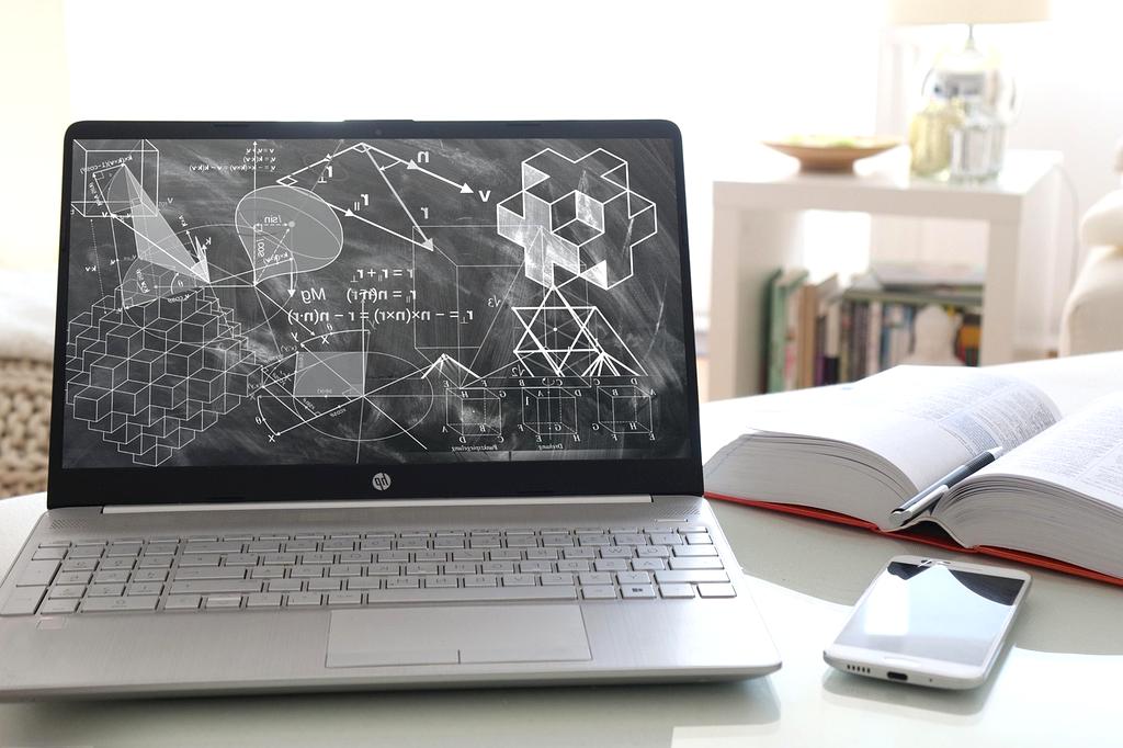 Abstract notebook with online courses icons and symbols